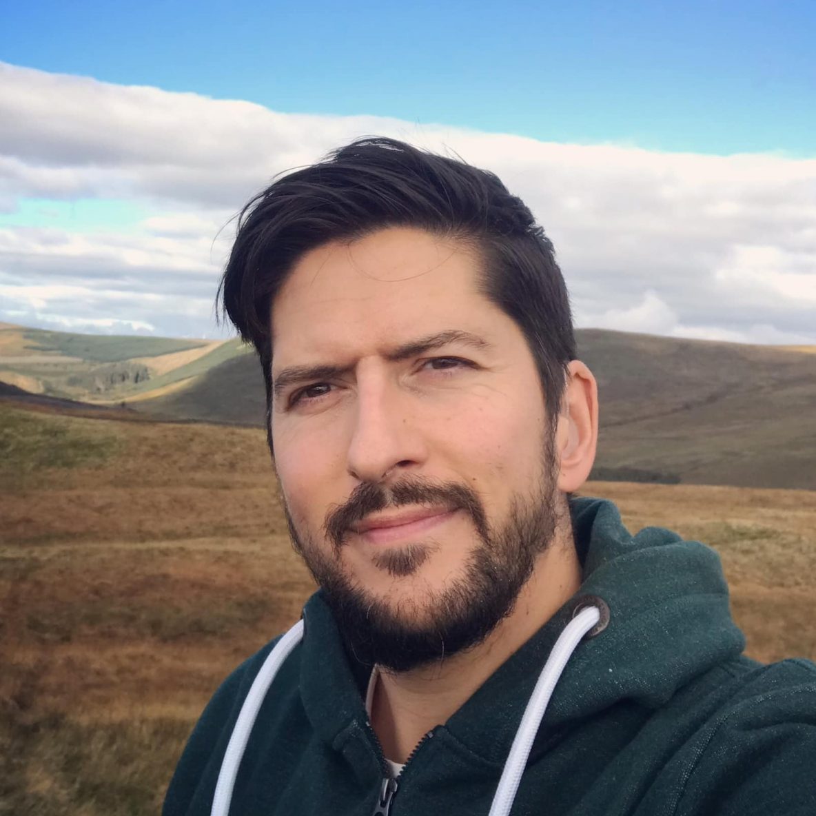 Photo of Mark standing outside