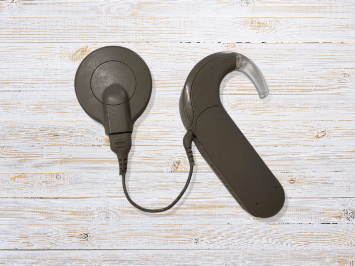 Cochlear implant on wooden table