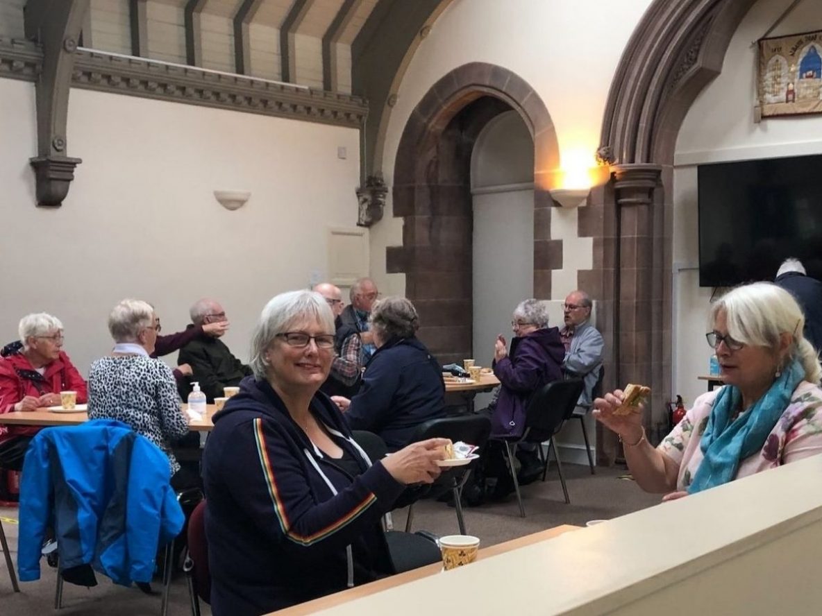 Women socialising in Deaf Action church