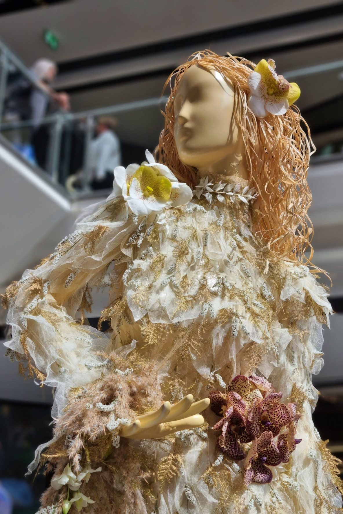 Flower covered mannequin